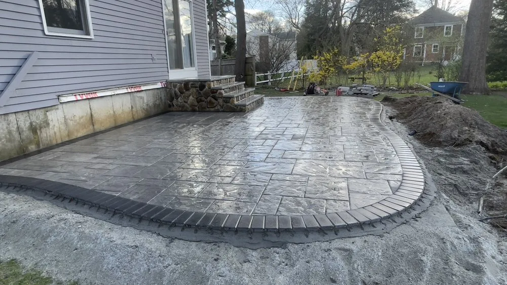 Professional landscape installation for homes in Framingham, MA by Side Job Landscaping