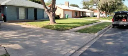 Custom garden landscaping for residential properties in Converse, TX by Sifuentes Lawn Care