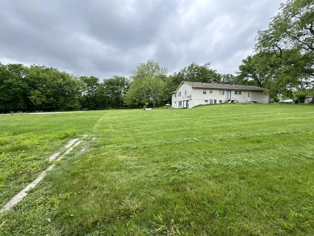 Expert lawn mowing service in Grain Valley, MO by Signature Elite Property Management