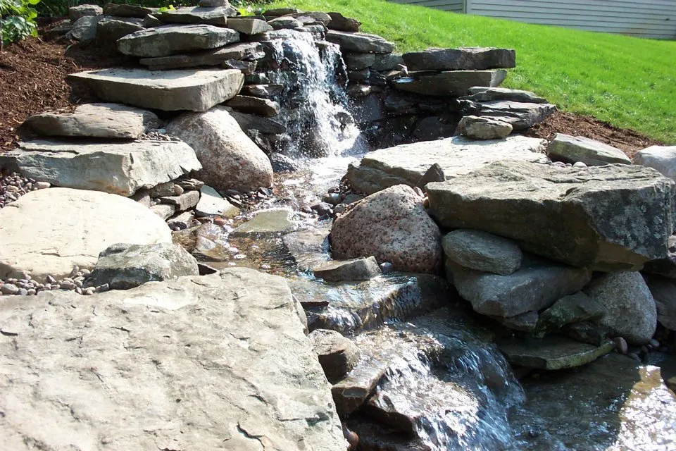 Custom lawn mowing service for residential properties across South Elgin, IL - Signature