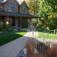 Custom lawn mowing service with custom design in South Elgin, IL by Signature