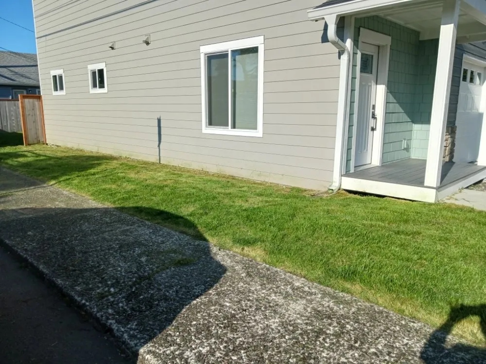 Professional lawn mowing service for residential properties in Gearhart, OR by Silva Lawn Care