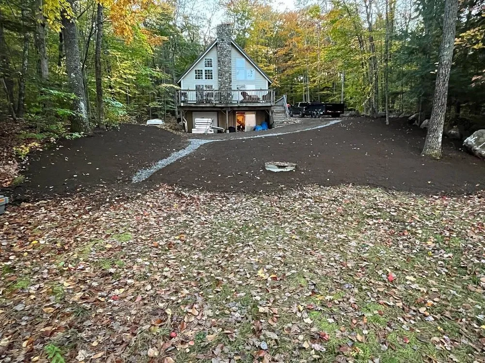 Custom outdoor landscaping in Oakland, ME by Silva Services