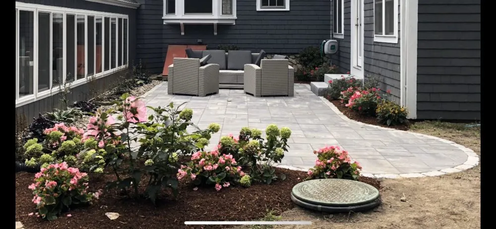 Expert yard maintenance for residential properties in Norwell, MA by Silver Fern Landscaping