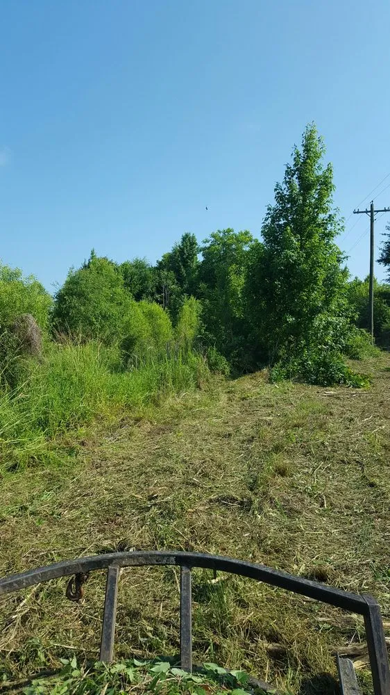 Custom lawn care service for residential properties in West Point, MS by Silver Leaf Construction