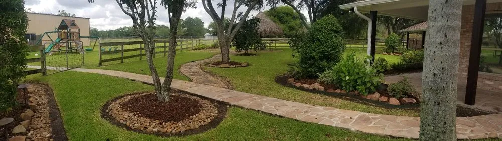 Custom lawn care service for residential properties in Friendswood, TX by Silverback Tree & Landscaping