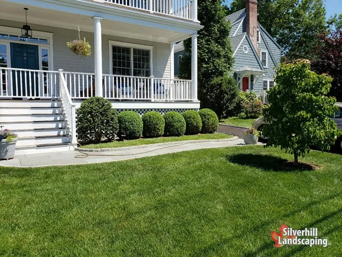 Custom landscape design for year-round maintenance in Trumbull, CT by Silverhill Landscaping