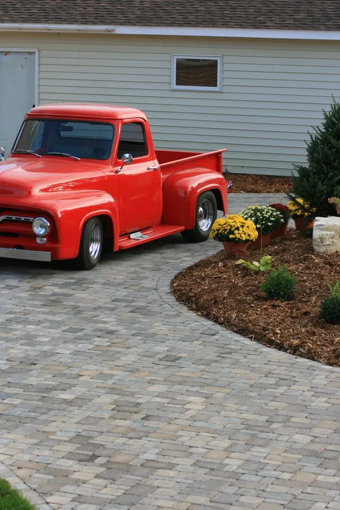 Custom landscape installation for outdoor upgrades in South Saint Paul, MN by Simons Landscaping