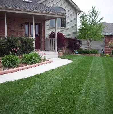 Custom landscape design in Iowa City, IA by Simply Mowing