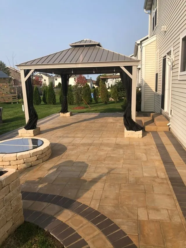 Professional landscape installation with custom design in Madison, WI by Simply Snow & Lawn