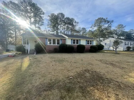 Simpson Lawn Care Logo