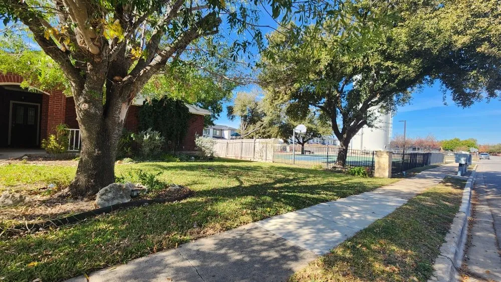 Expert landscaping services for residential properties in Austin, TX by Sinai Tree and Lawn Care Experts