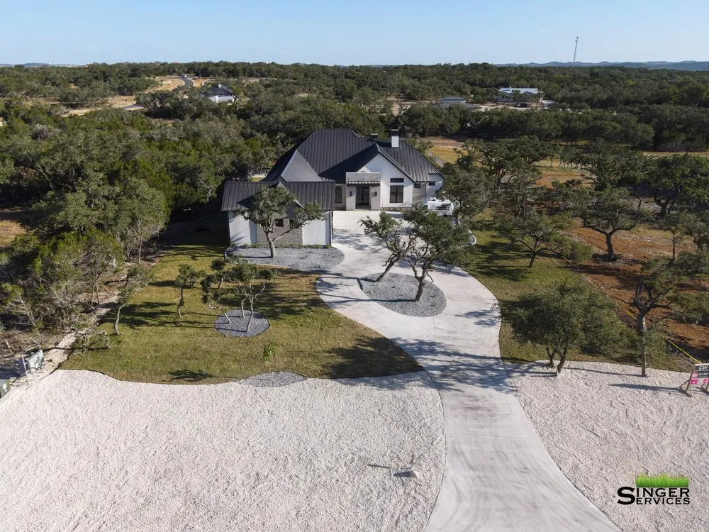 Trusted lawn mowing service with custom design in Bulverde, TX by Singer Services