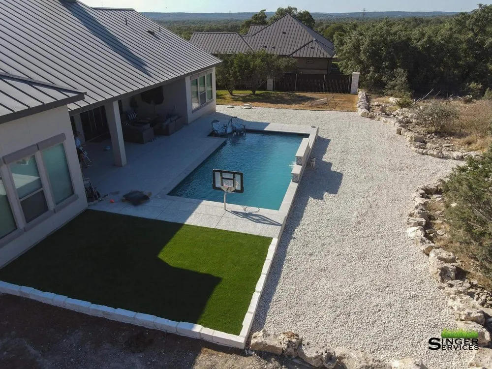 Custom yard cleanup service in Bulverde, TX by Singer Services