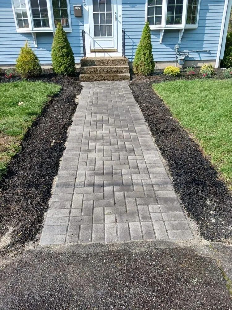 Trusted lawn care service for homes across Rockland, MA - Siqueira Landscape Construction
