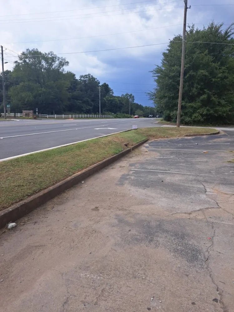 Local lawn mowing service for residential properties in Morrow, GA by Sir Garvin Landscape