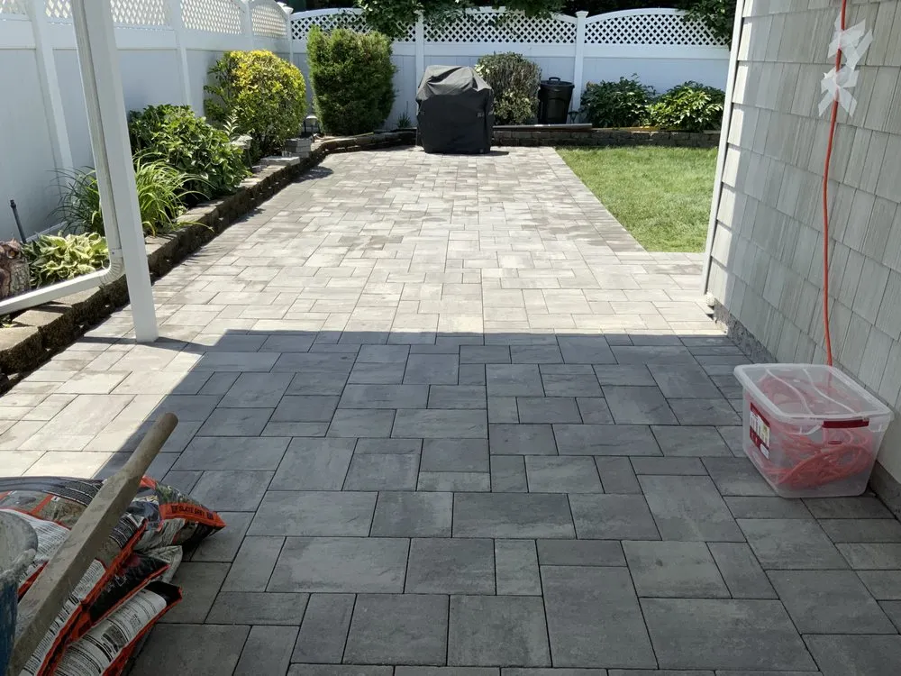 Custom lawn mowing service for year-round maintenance across Copiague, NY - Sivirian Landscaping and Masonry