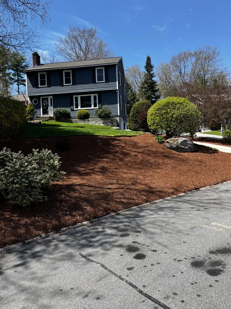 Affordable landscape design for year-round maintenance in Merrimack, NH by Skelley Landscaping