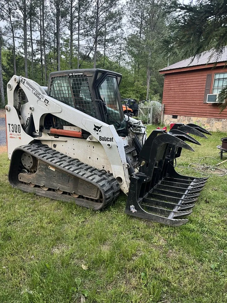 Affordable yard cleanup service for residential properties across Chatsworth, GA - Skid-er-Done