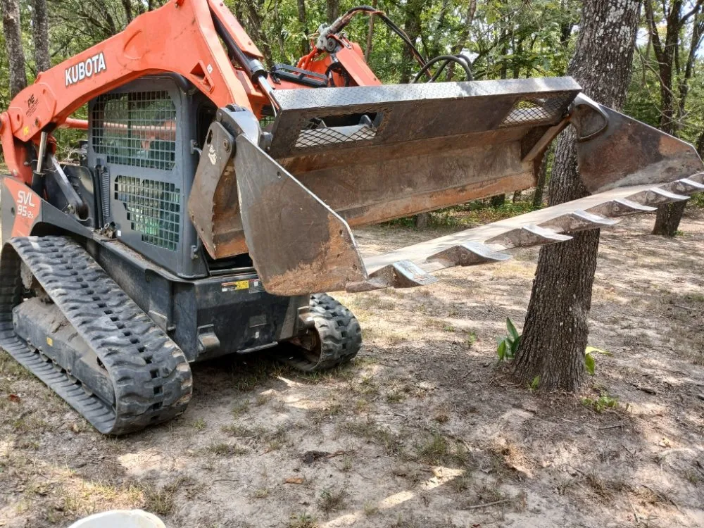 Professional yard cleanup service with custom design across Greenville, TX - Skid Steer Work