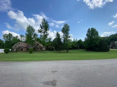 Professional lawn mowing service for homes in Germantown, TN by Skinner Landscaping And Lawn Services