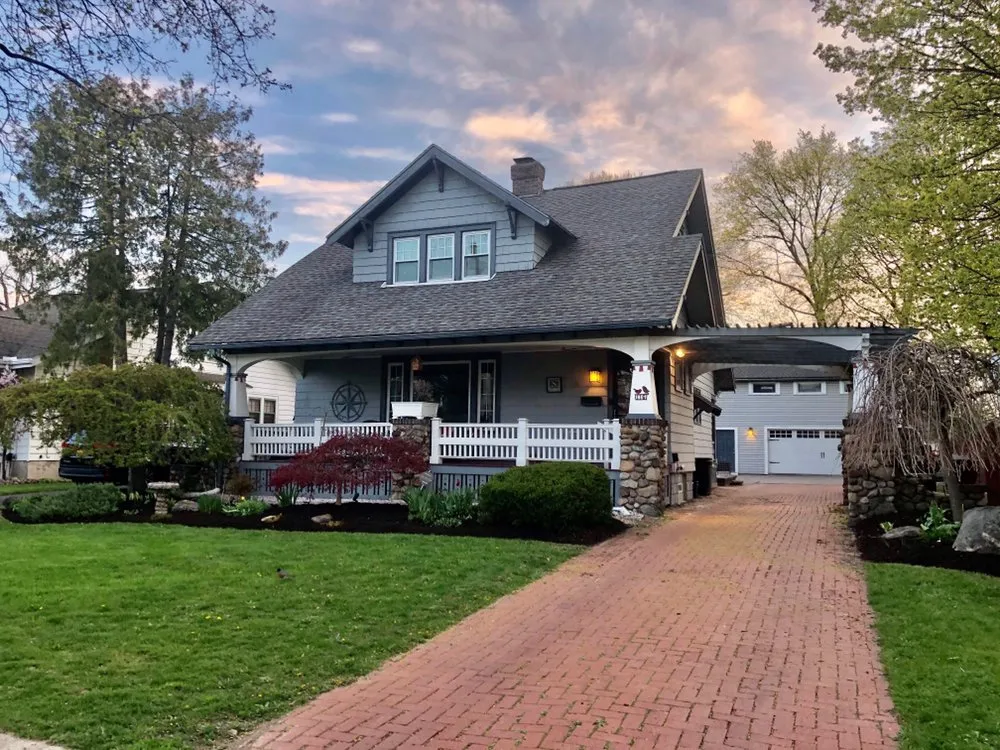 Trusted lawn mowing service with custom design in Syracuse, NY by Skinner Professional Services