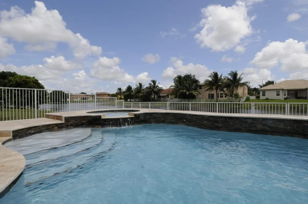 Custom landscape installation in Coconut Creek, FL by Skyler Pool And Spas, Inc