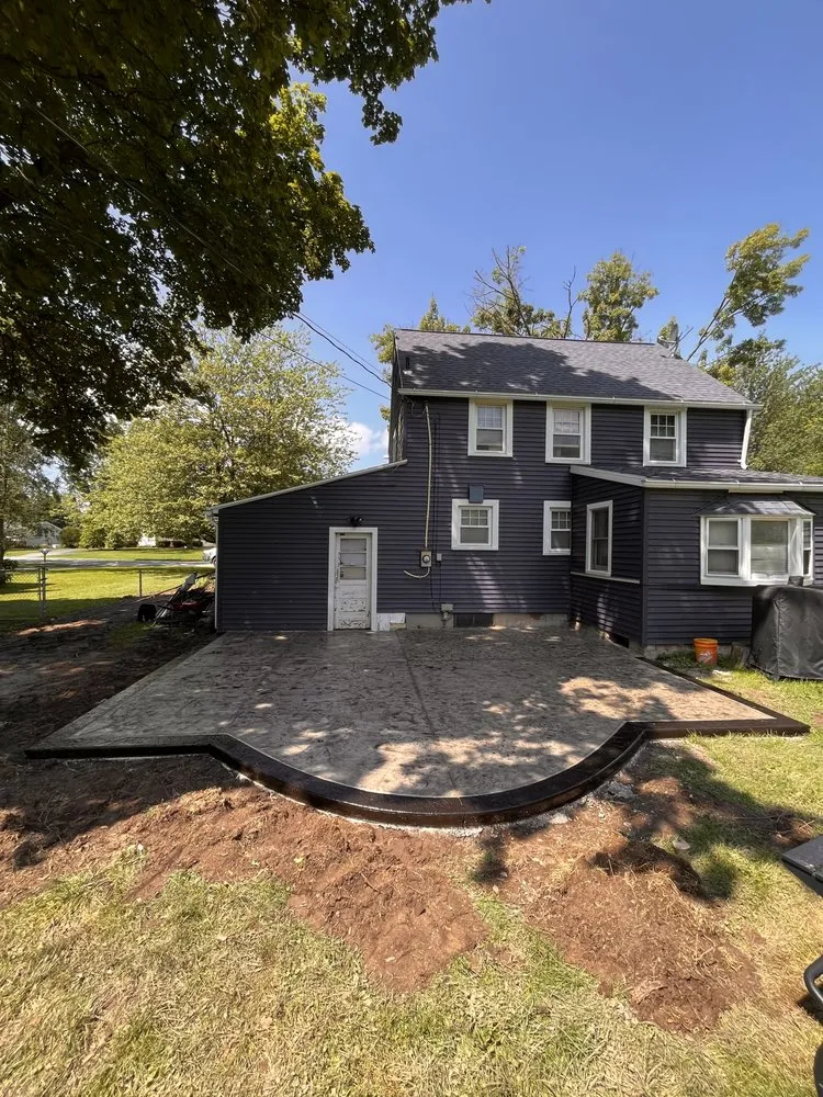 Trusted lawn mowing service for outdoor upgrades in Webster, NY by Skyroc Property Improvements