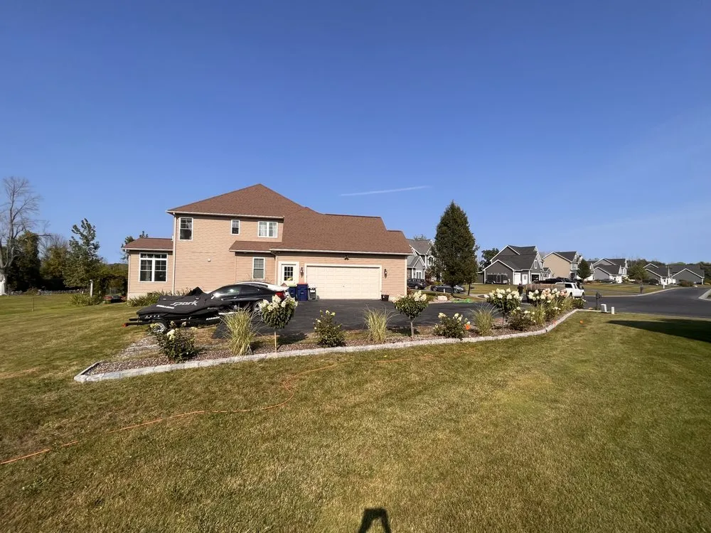 Expert garden landscaping with custom design in Webster, NY by Skyroc Property Improvements