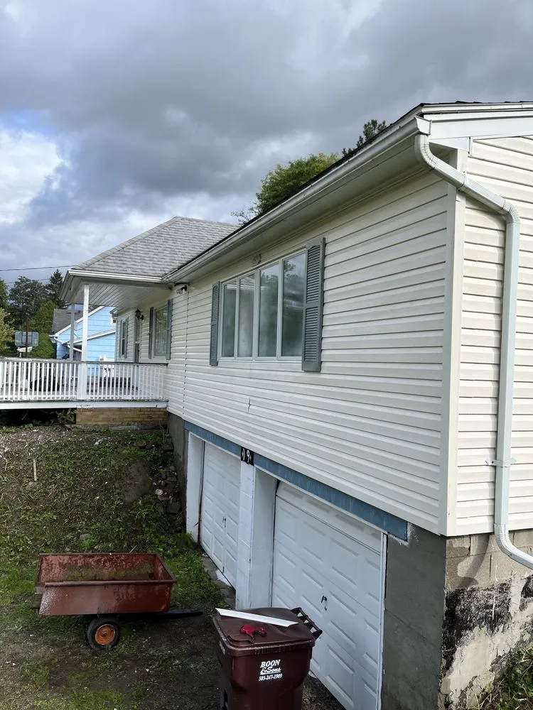 Expert lawn mowing service for outdoor upgrades in Webster, NY by Skyroc Property Improvements