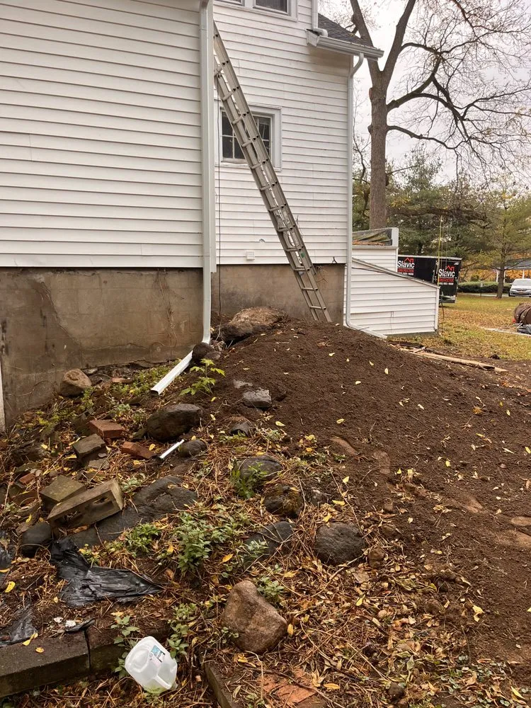 Local garden landscaping with custom design in Webster, NY by Skyroc Property Improvements