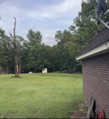 Slades Lawn Care Services Logo