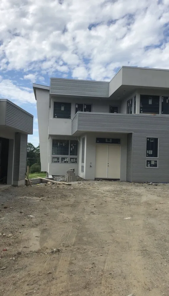 Custom lawn mowing service experts serving New Rochelle, NY - SLI Construction