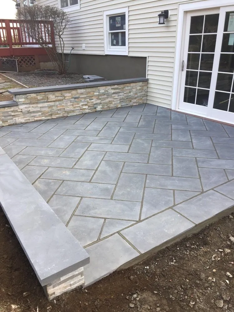 Professional landscape installation with custom design in New Rochelle, NY by SLI Construction