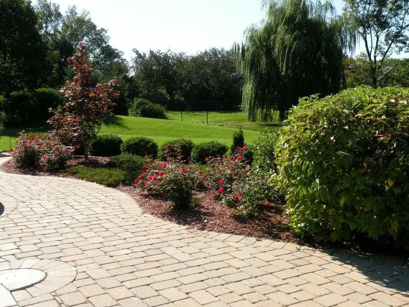 Professional yard maintenance with custom design in Libertyville, IL by Sloan's Brick Paving