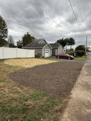 Slocum Landscaping & Concrete Logo