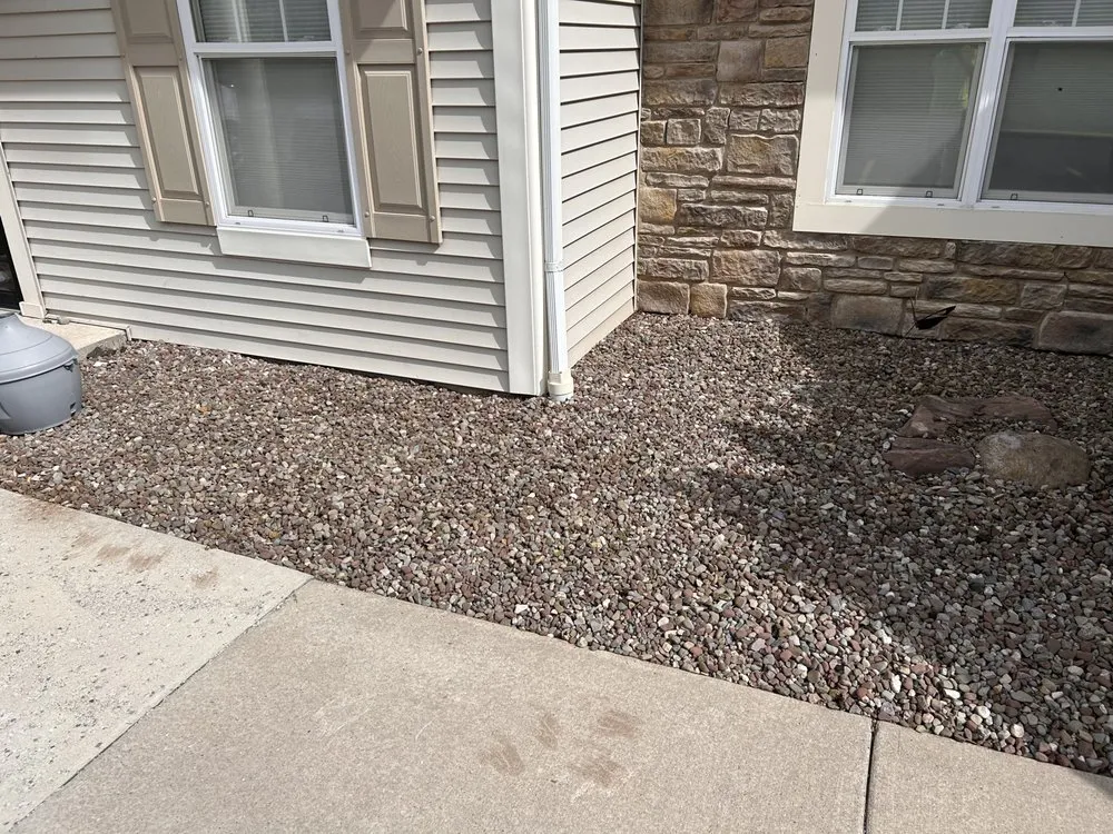 Expert lawn mowing service with custom design in Spencerport, NY by SLS