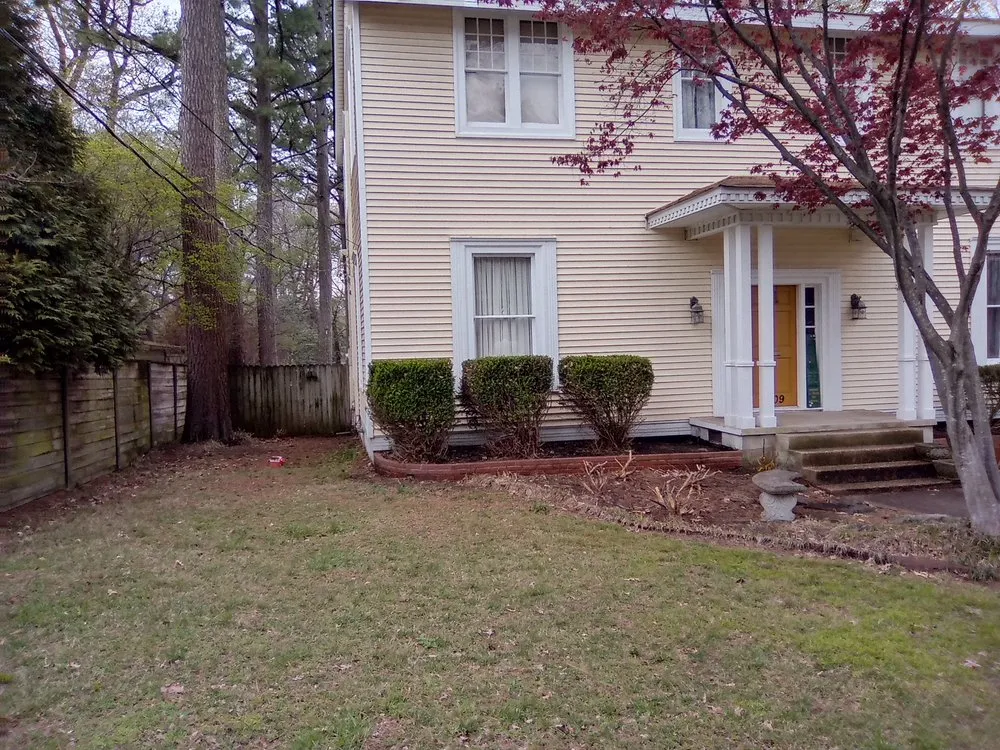 Custom landscape design for year-round maintenance in Jonesboro, AR by S&M LawnPro