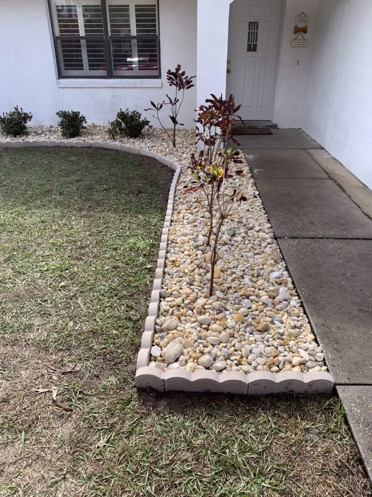 Custom lawn care service with custom design in Inverness, FL by Small That's All Weeding and Planting Service