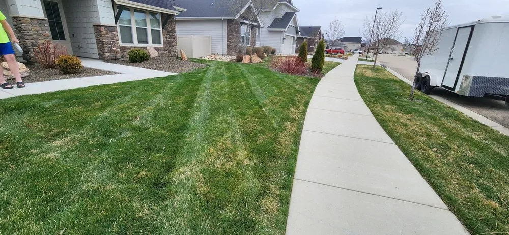 Custom landscape installation for residential properties in Kuna, ID by Small Town Lawn Service