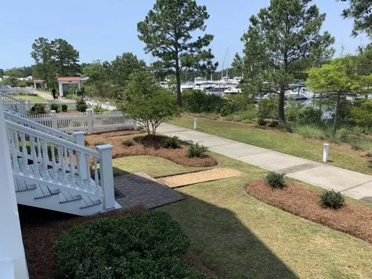 Smalls mowing and landscaping Logo