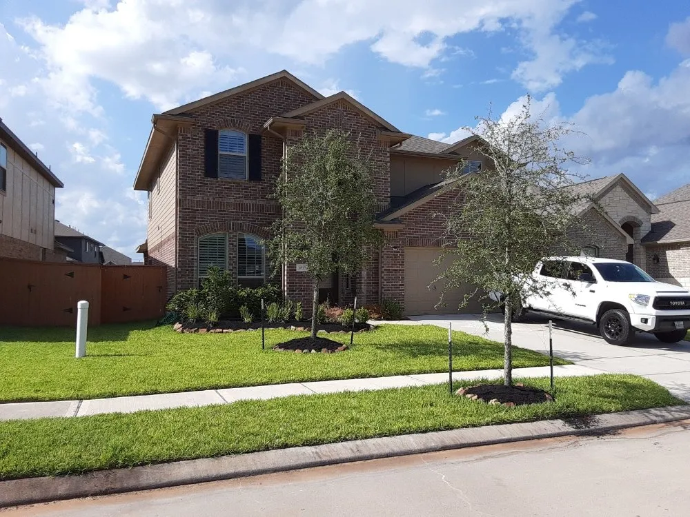 Custom yard maintenance for residential properties in Spring, TX by Smart Dumb Katz Landscaping