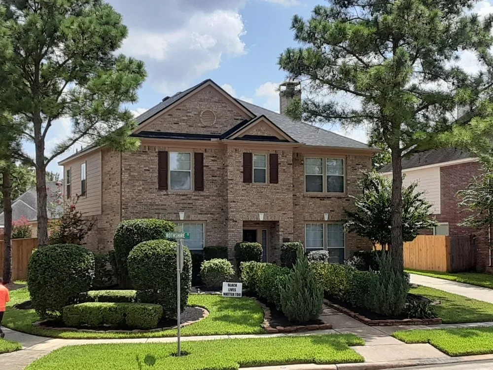 Professional outdoor landscaping in Spring, TX by Smart Dumb Katz Landscaping