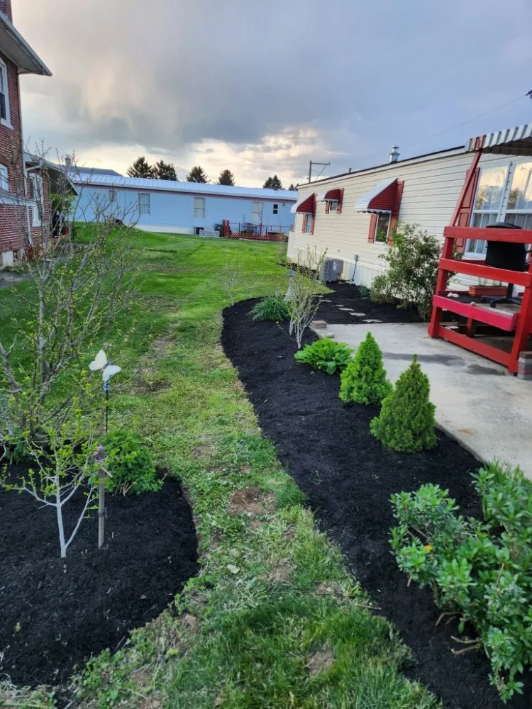 Affordable lawn care service for homes in Breinigsville, PA by Smart Property Management