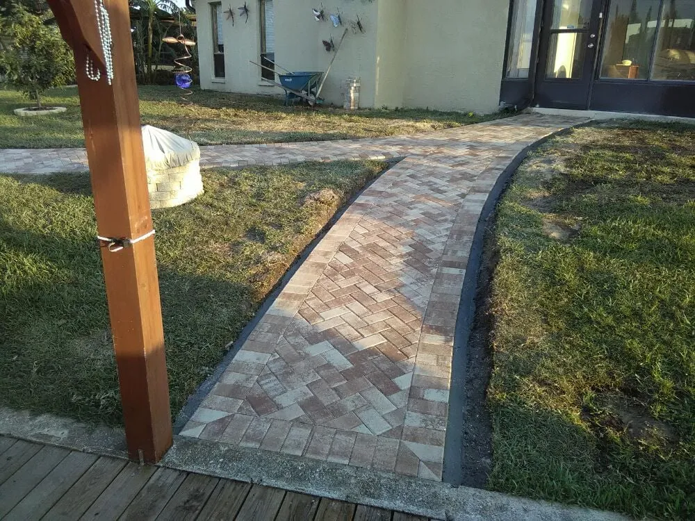 Local yard cleanup service for year-round maintenance across Port Richey, FL - Smartt Pavers
