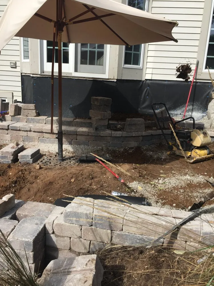 Professional landscaping services for residential properties in Woodstock, IL by SMG Lawn & Landscaping