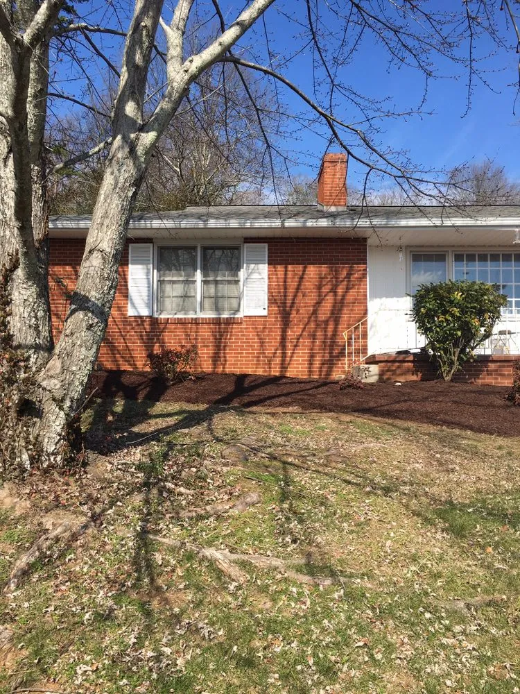 Custom garden landscaping for residential properties in Maynardville, TN by Smith landscaping and lawn care