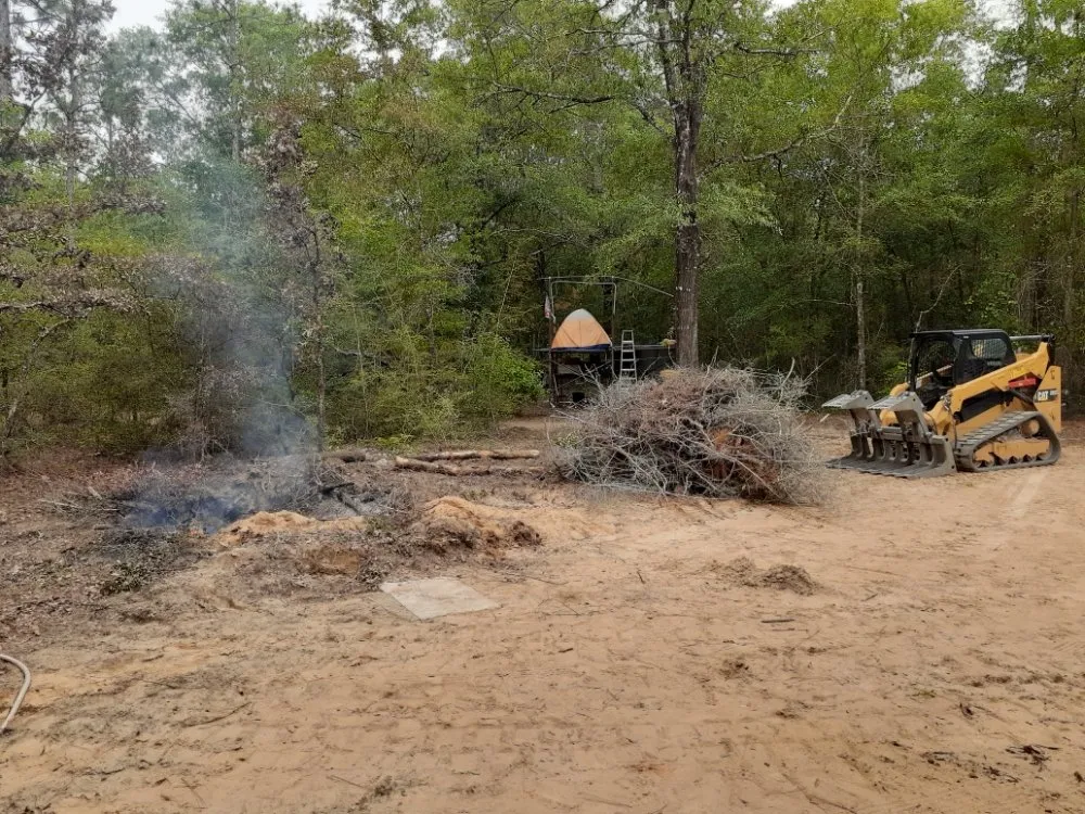 Affordable yard cleanup service for year-round maintenance in DeFuniak Springs, FL by Smith's landscaping