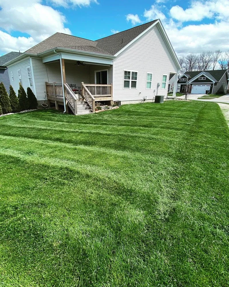 Trusted lawn mowing service with custom design across Otisco, IN - Smith's Quality Lawn Care