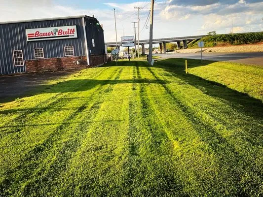 Smith's Quality Lawn Care Logo